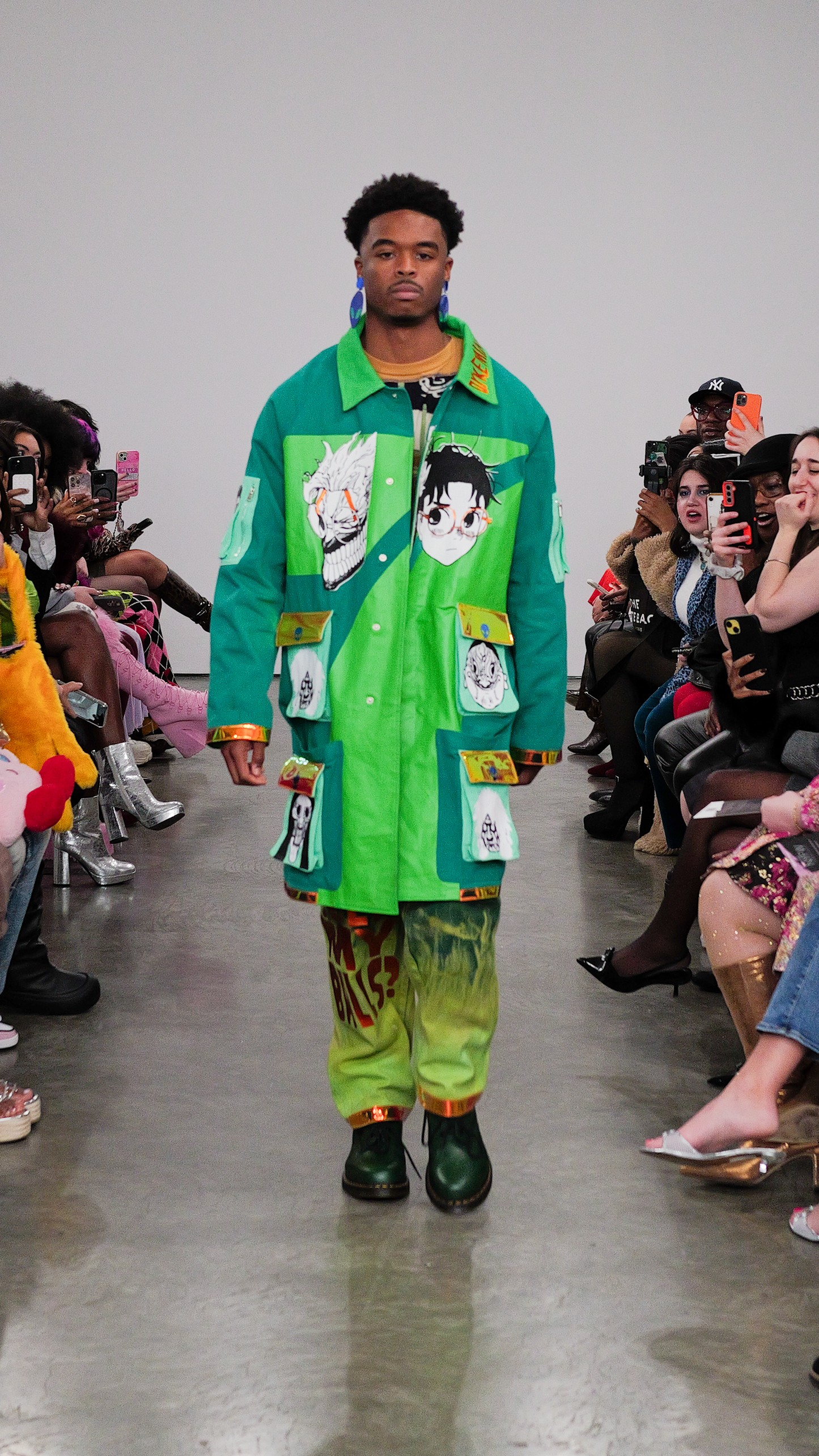 the faces of yokai, aliens, and a human trench coat —NYFW